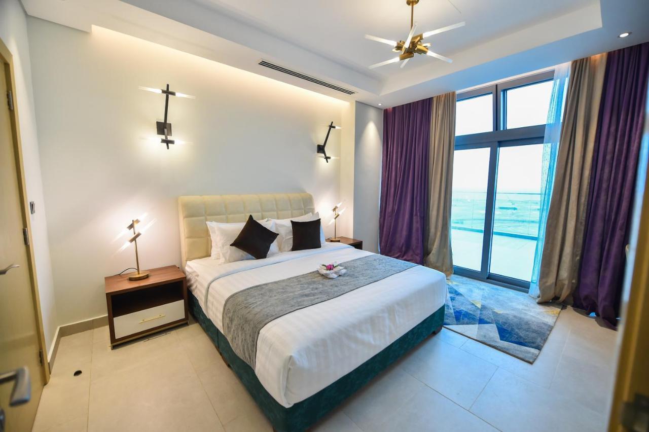 Waterfront Hotel Apartment Lusail Exteriör bild A bedroom at the hotel
