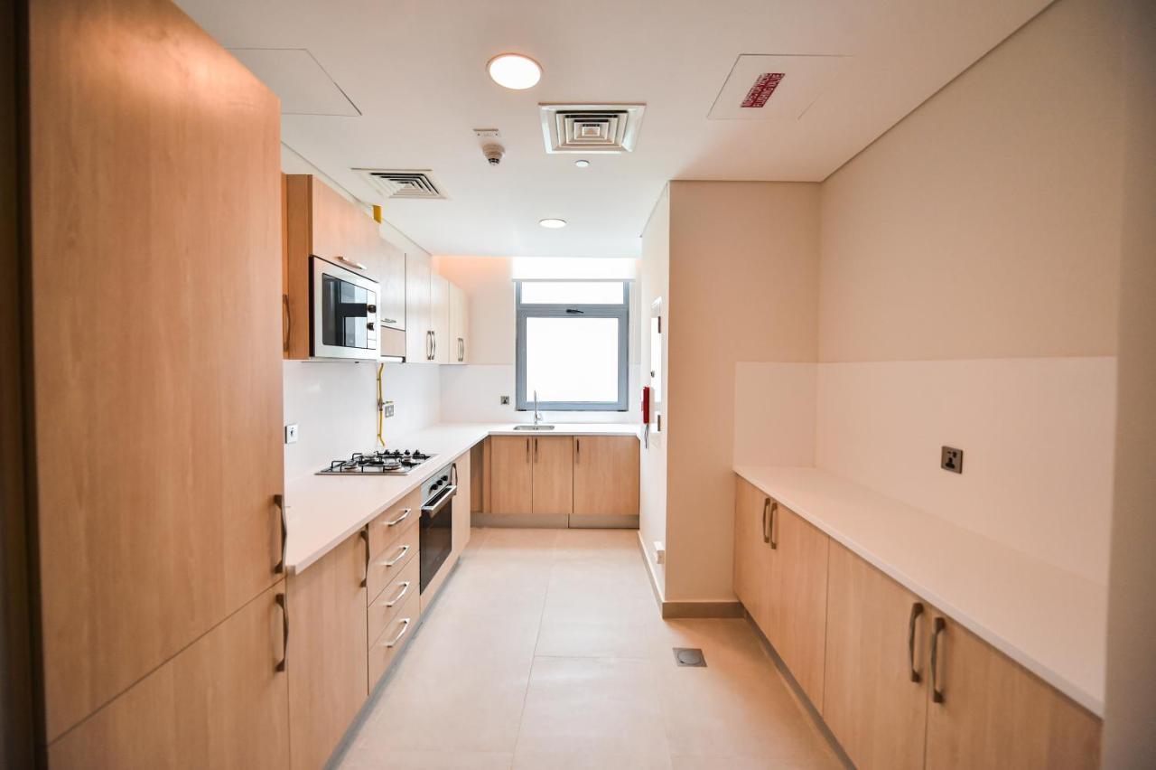 Waterfront Hotel Apartment Lusail Exteriör bild A typical kitchen in a student flat