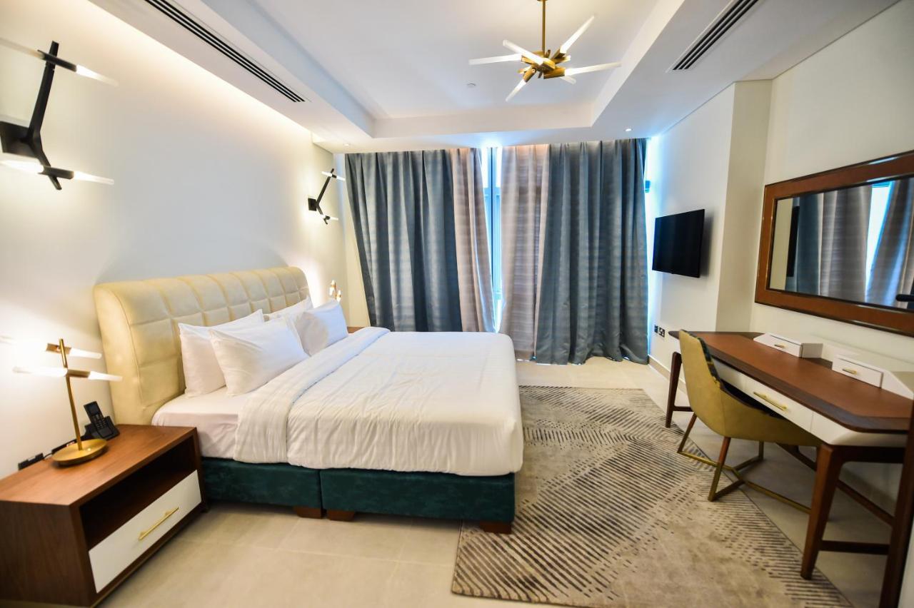 Waterfront Hotel Apartment Lusail Exteriör bild A bedroom at the hotel