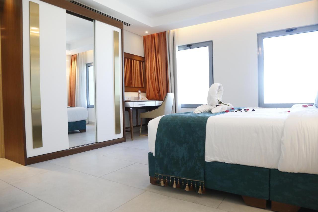 Waterfront Hotel Apartment Lusail Exteriör bild A bedroom at the hotel